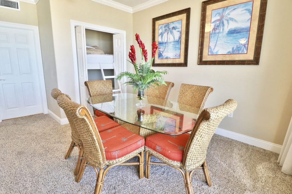 Twin size bunkbeds in the cubby behind the dining table.