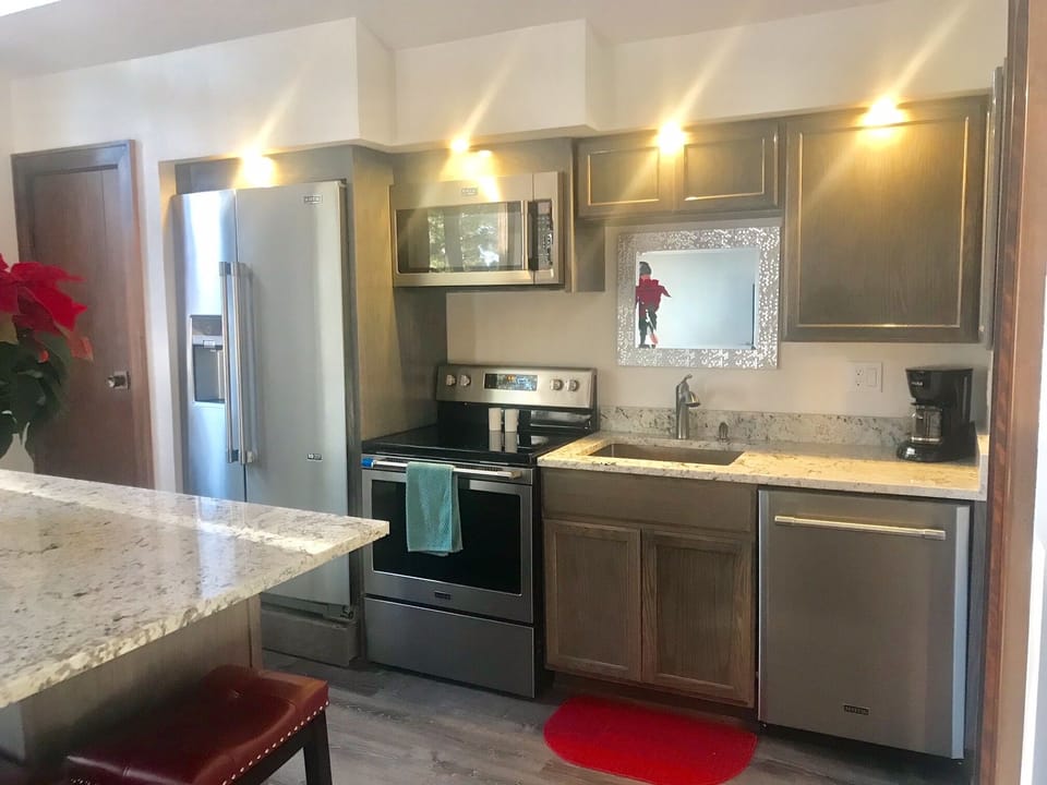Full Size Kitchen fully equipped for cooking. 