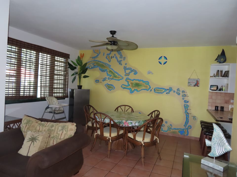 dining room with view of the water right outside the windows