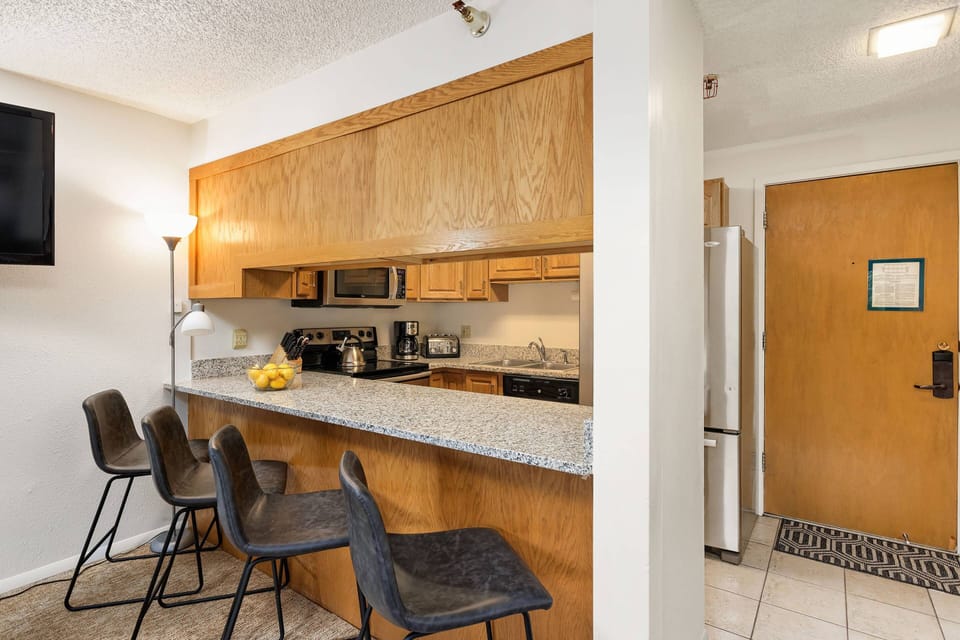 Enjoy comfortable seating at the breakfast bar.