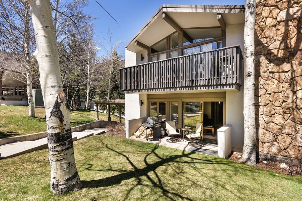 Your private patio features a gas grill and poolside access.  Soak up the Colorado sunshine while relaxing here during your vacation.