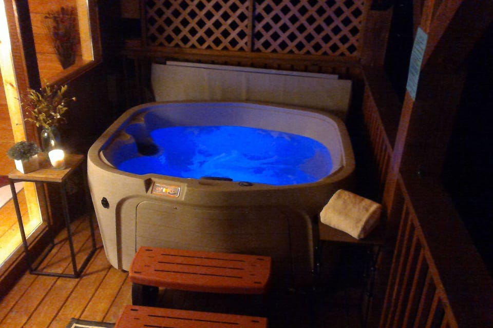 HOT TUB - Top balcony, with Mountain VIEWS! LED lights feature and waterfall