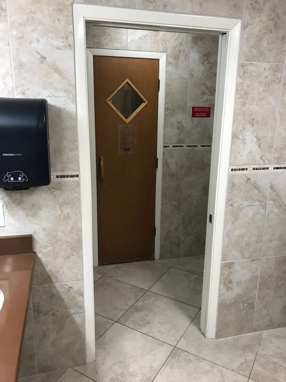 Common area bathrooms with his and her saunas.