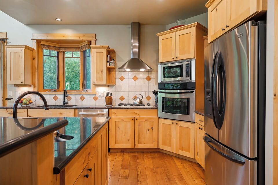 Fully equipped kitchen with stainless steel appliances