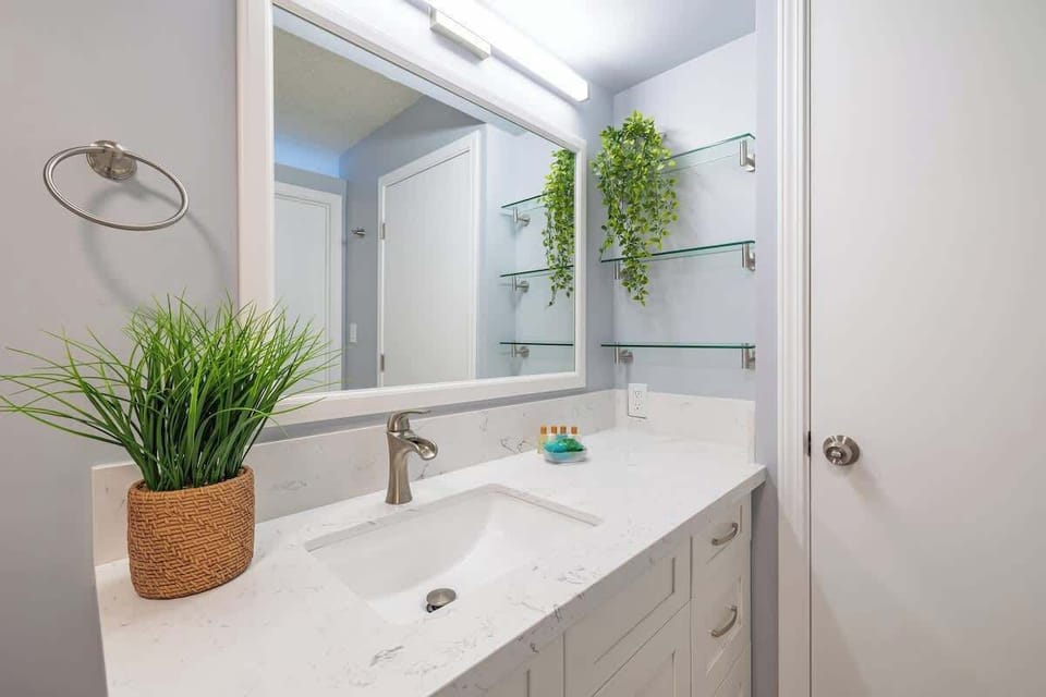 Renovated bathroom with plenty of storage space