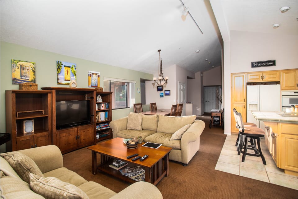 Living/Dining/Kitchen in one large open concept space for everyone to congregate