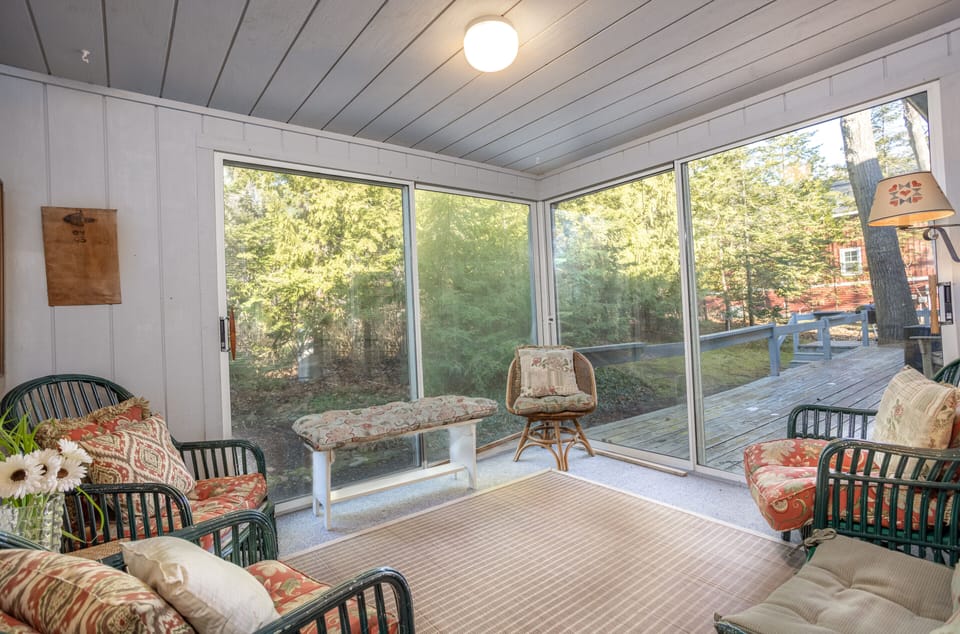 Three-season porch for morning coffee. Views of quiet backyard and shade garden
