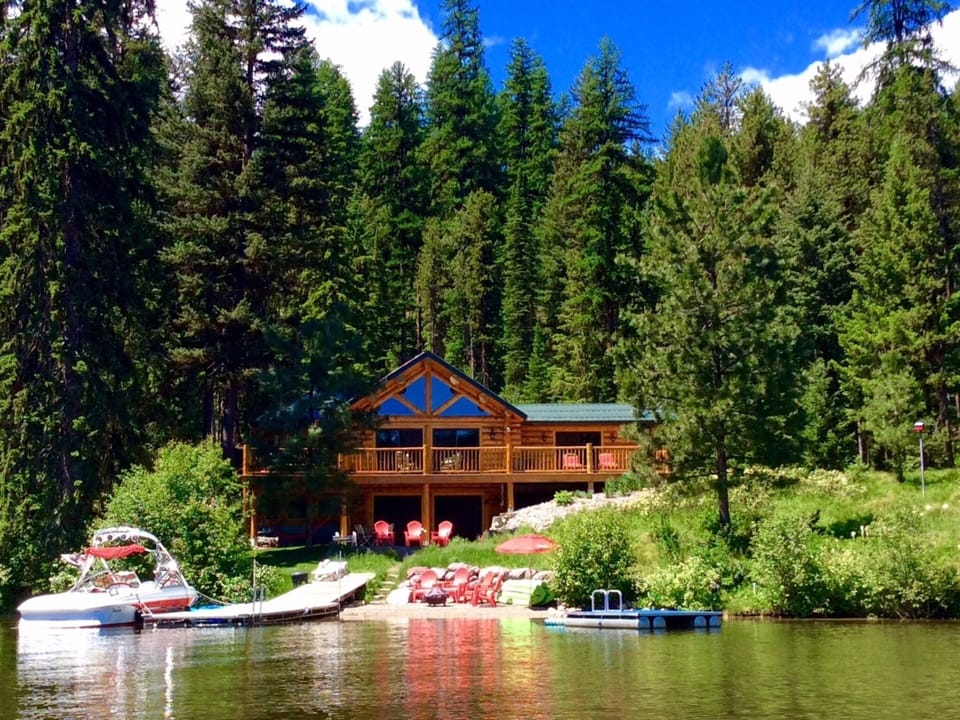 Enjoy our roomy upscale rustic log home with private beach on the lake