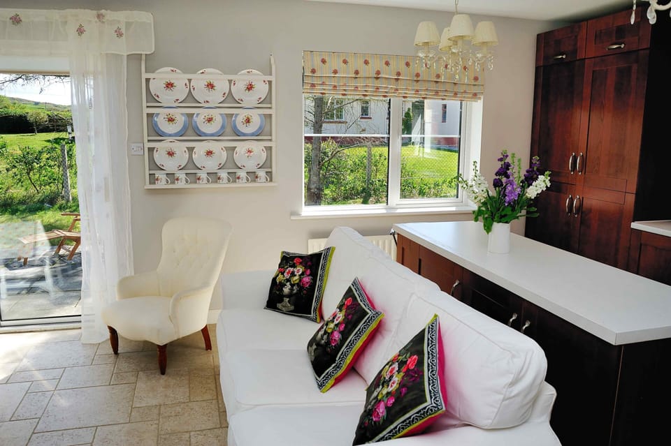 Large kitchen area with comfy sofa