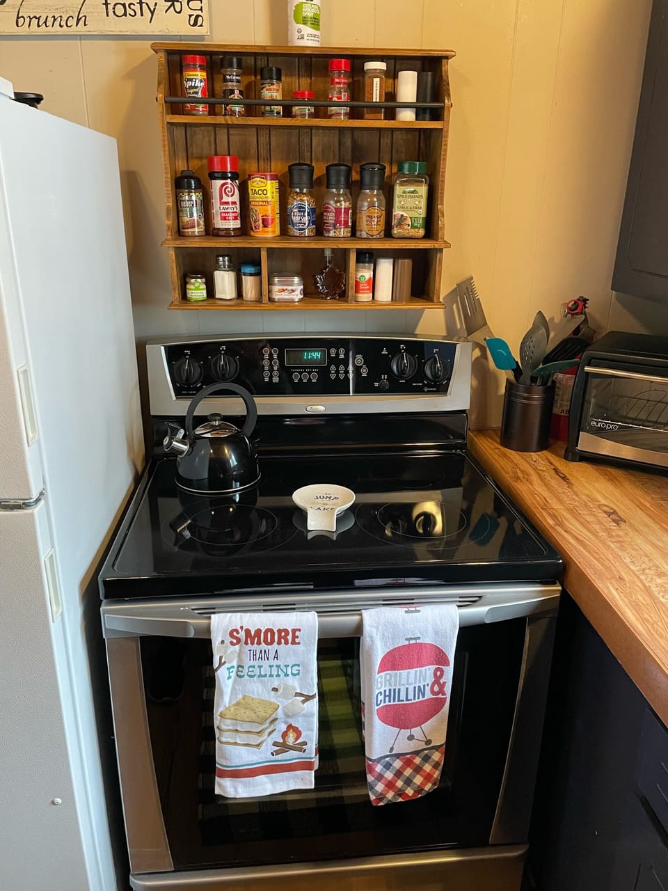 Newer electric stove and lots of spices for your use