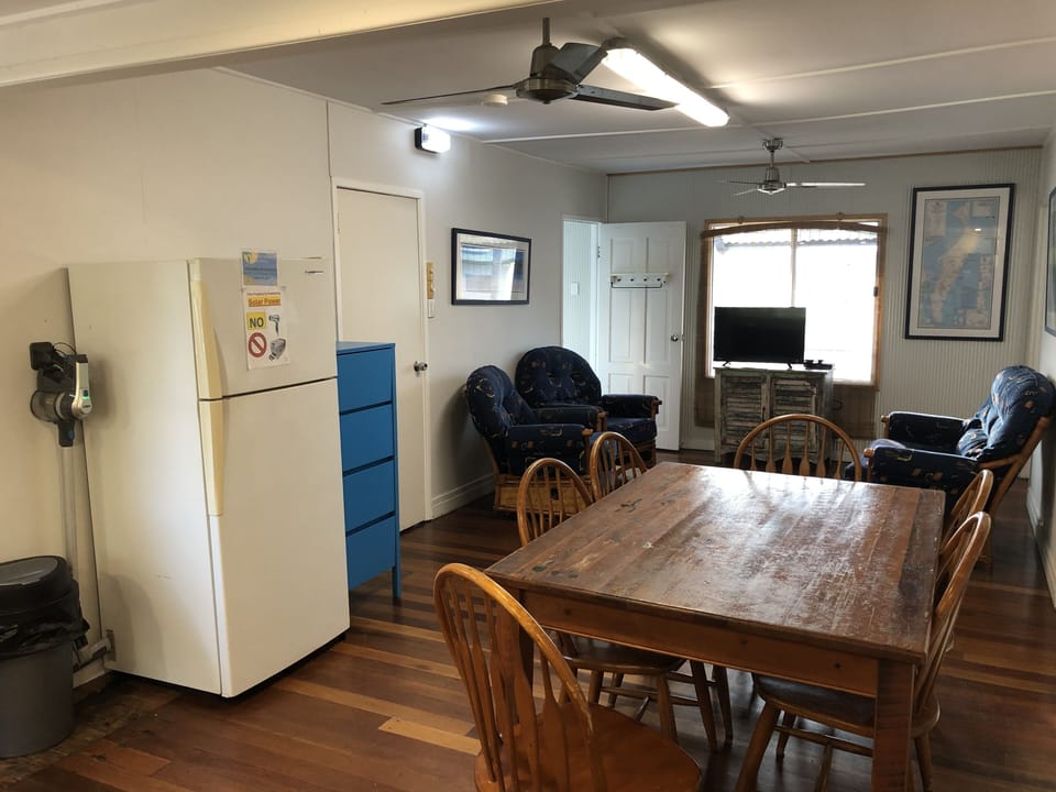 Upstairs refrigerator and vacuum cleaner