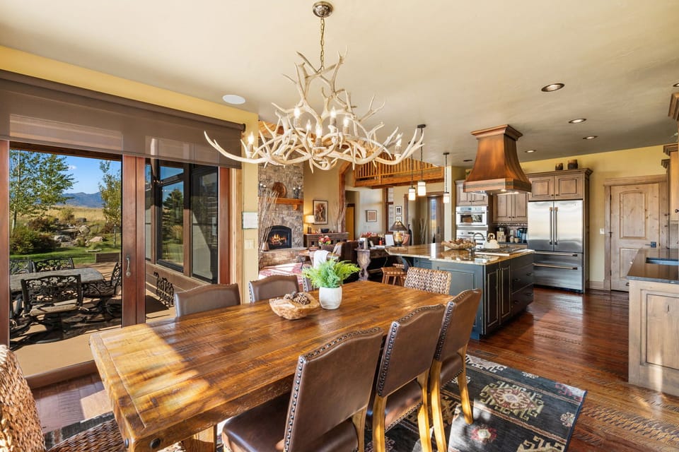 Seating at the dining table for 8 and additional seating at the oversized island.