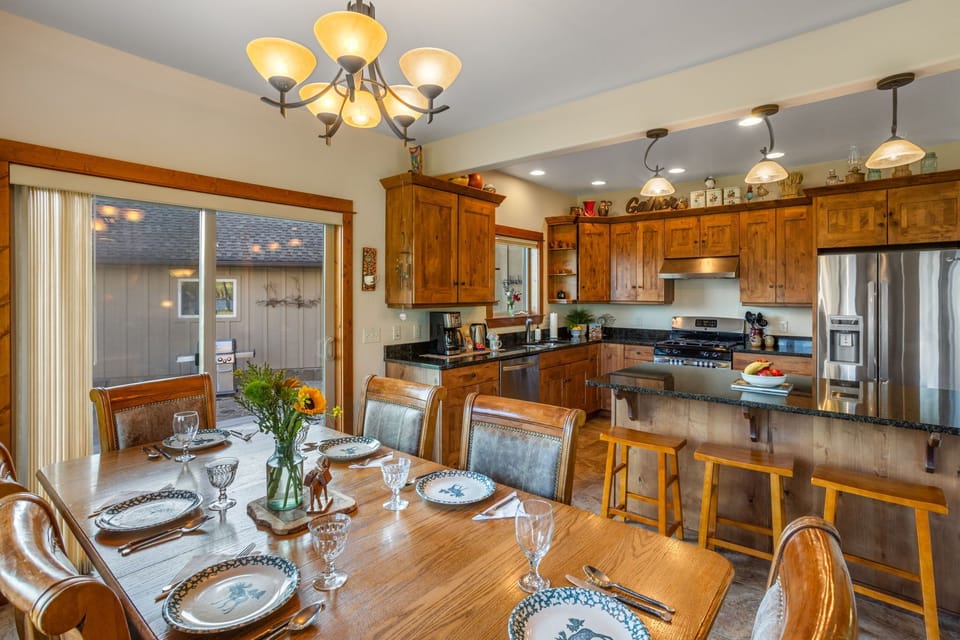 A dream kitchen and dining area with absolutely all essentials and more you need for entertaining, cooking and creating your "home away from home" vacation!