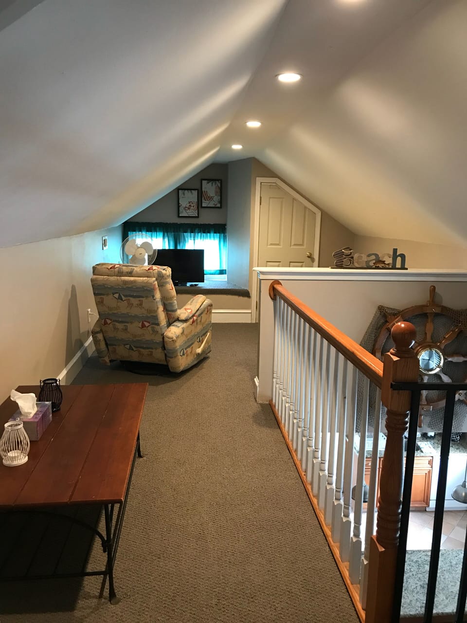 Loft (not pictured-twin bed behind wall )