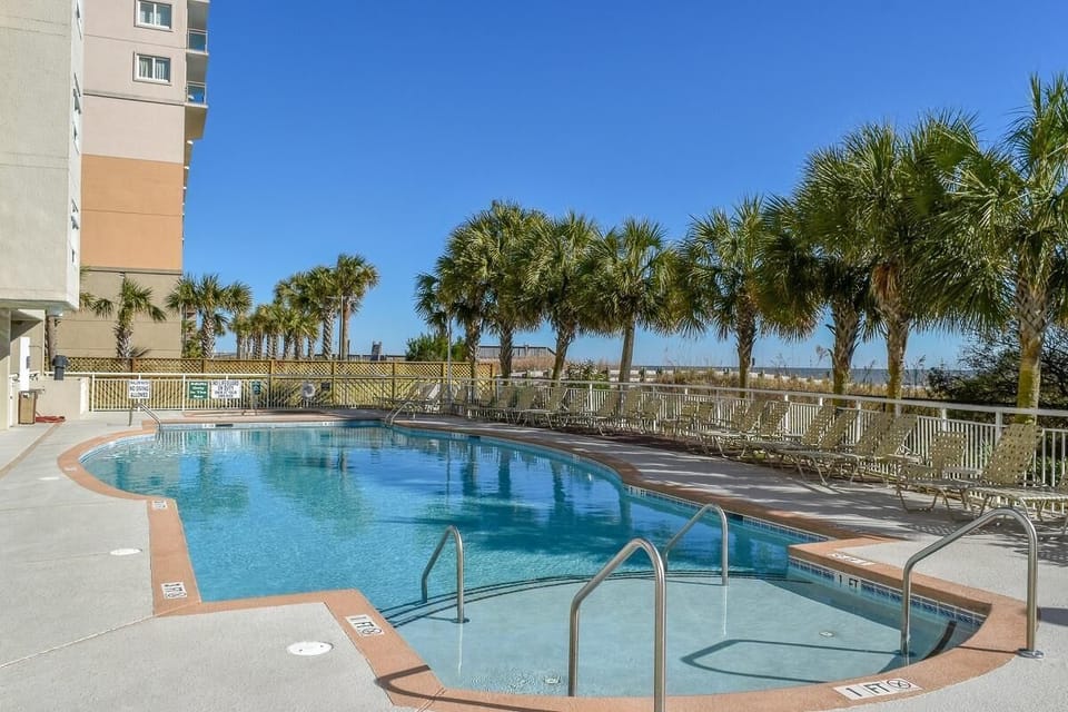 Beach side Pool with Lounge Chairs!