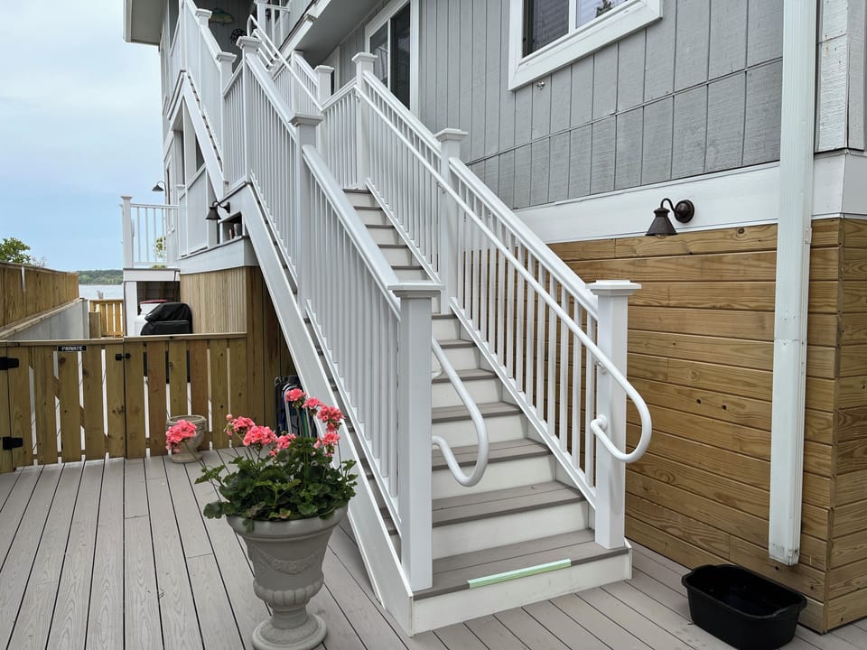 Building raised to flooding
Steps to the unit.  leave  beach gear under 