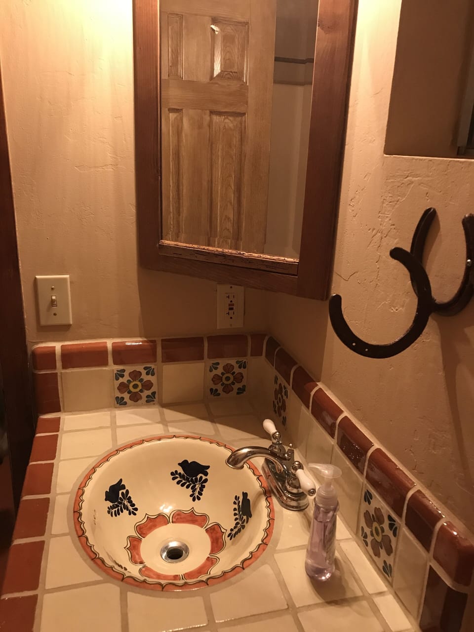 This beautiful Mexican tile and sink is accented perfectly by this cabinet.