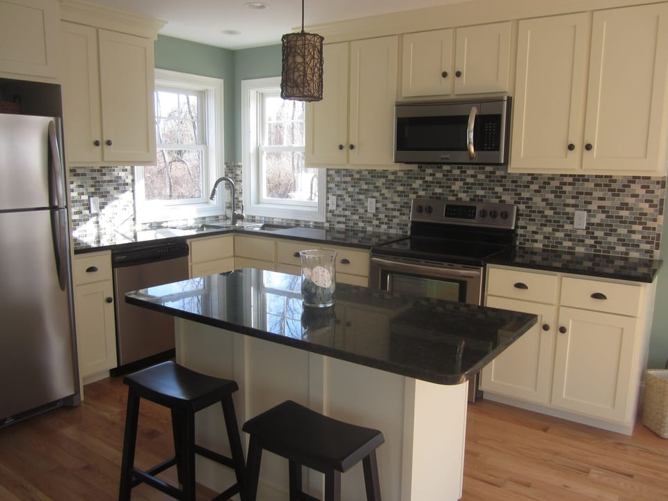 Kitchen with seating available at center island.