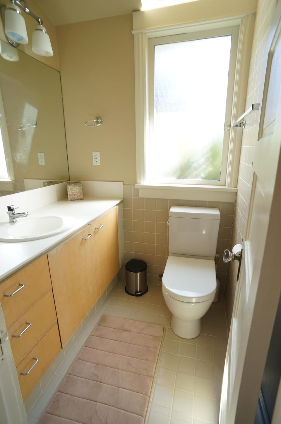 Bathroom for the north bedroom has large shower with dual shower heads