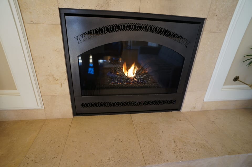 Real  fireplace, Nest thermostat controls central heat. Euro stylish AC too.