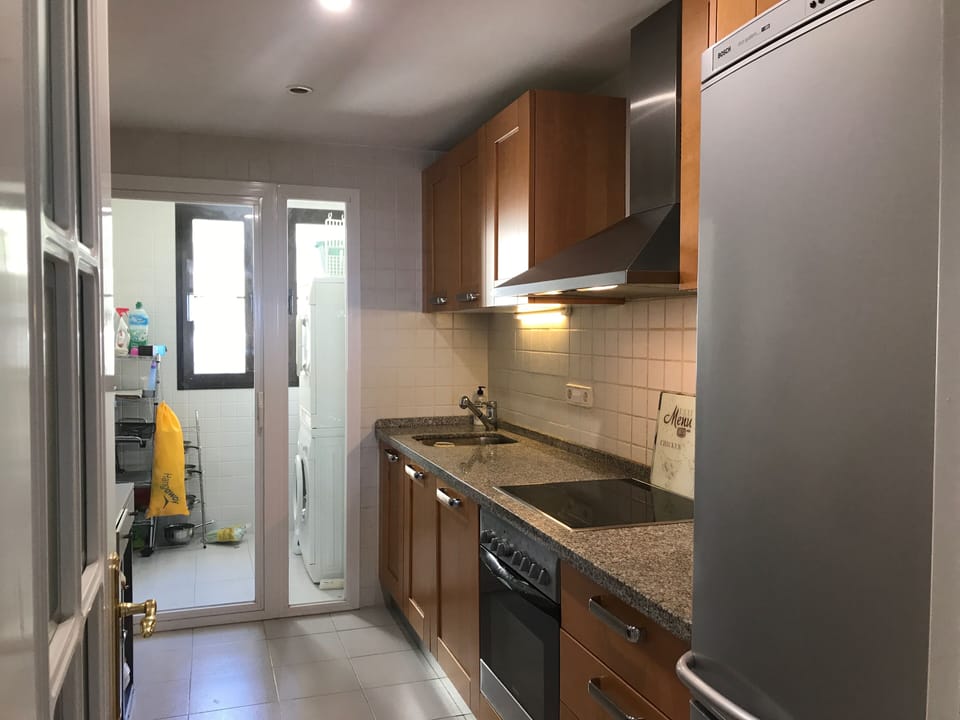 Kitchen & small utility with washer & dryer to the rear