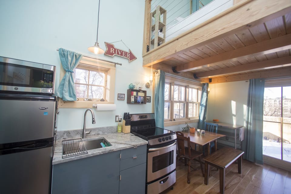 Loft style space with small kitchen & bath.