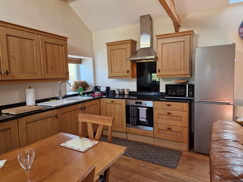 Kitchen area including dishwasher, fridge/freezer, washing machine,  hob & oven