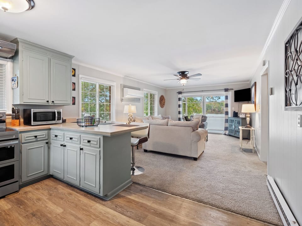 Living room /kitchen combo with views for all windows