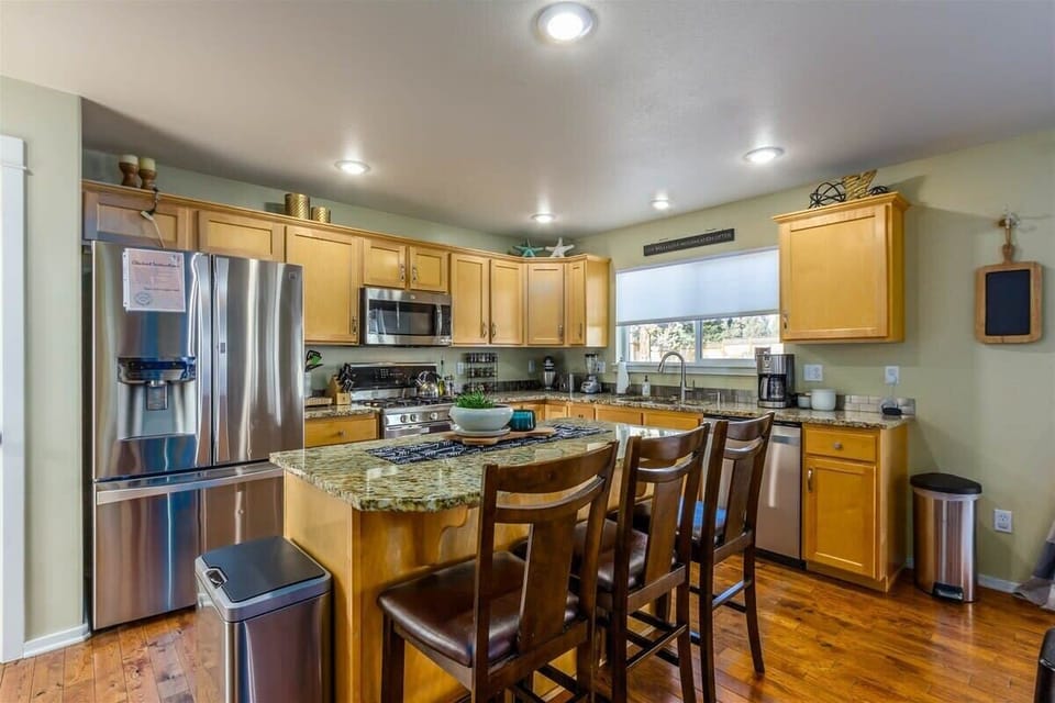 Updated and fully stocked kitchen, everything you need to cook a meal.