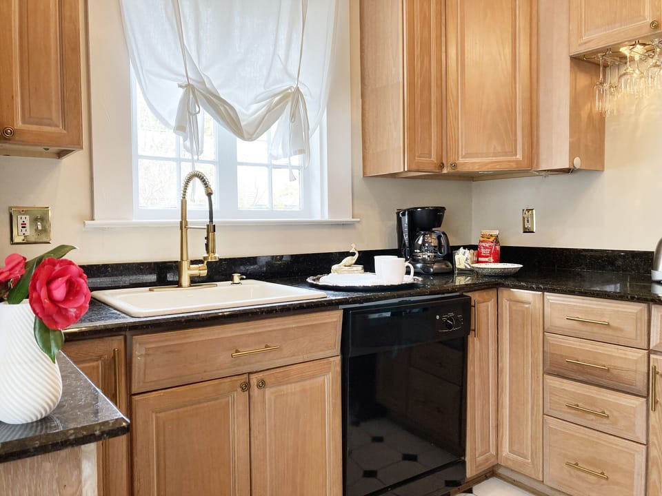 kitchen will full size appliances and dishwasher, coffee maker ...
