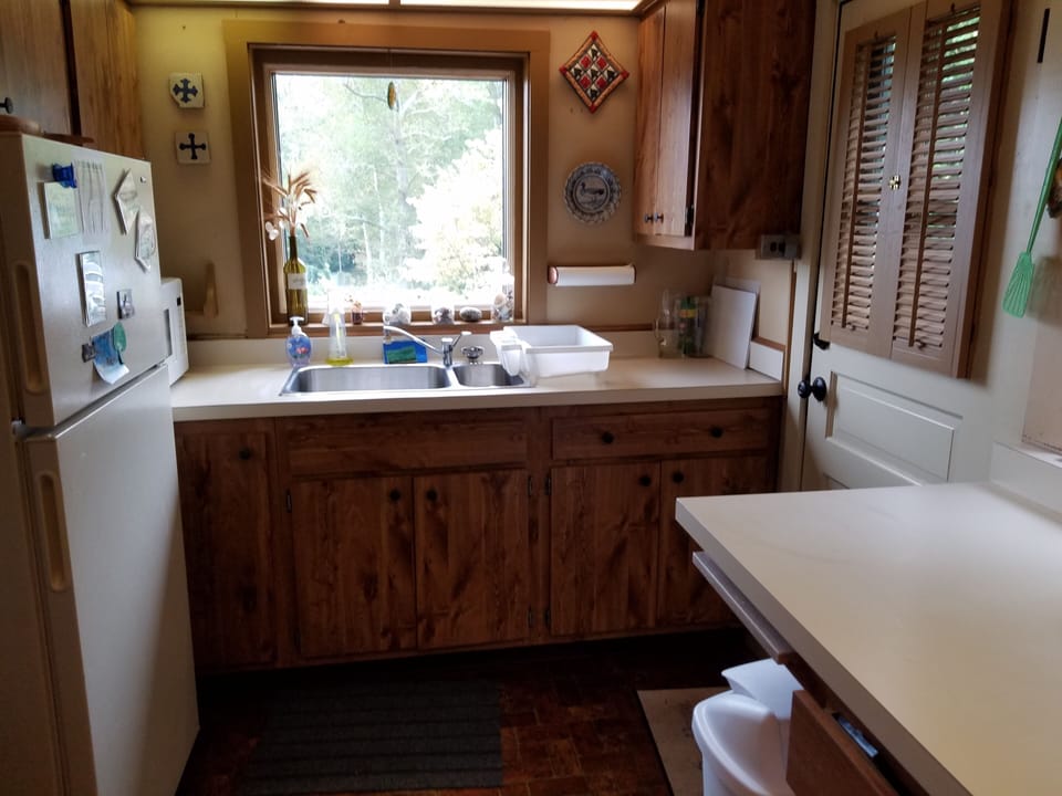 Kitchen with a tranquil view.