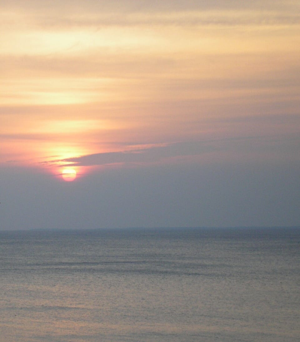 Sunrise over the Chesapeake.  180-degree full view of the water.