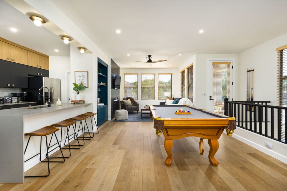 Pool table, breakfast bar, living space
