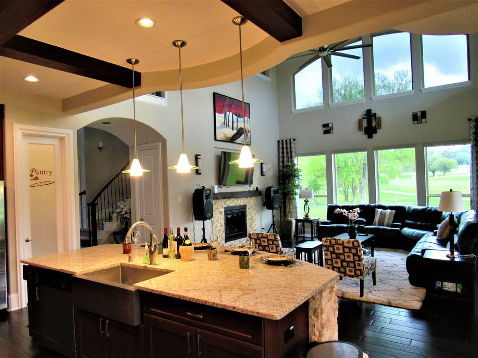Kitchen/Living Room Overlooking the Golf Course. Fireplace Off.
