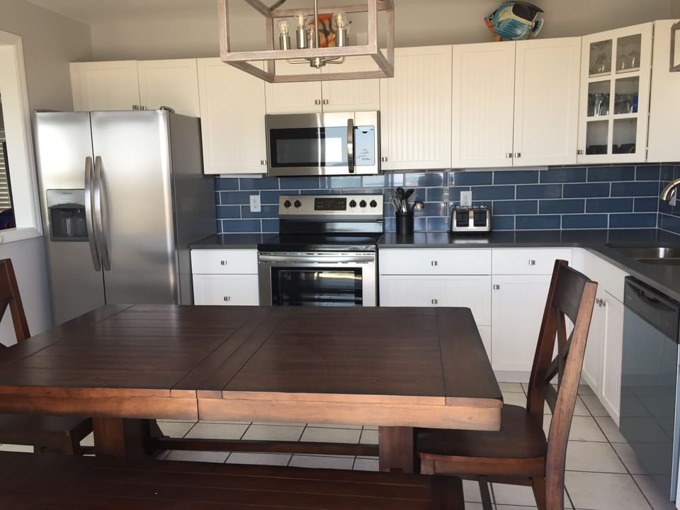 Remodeled kitchen with quartz counter tops and new stainless appliances!