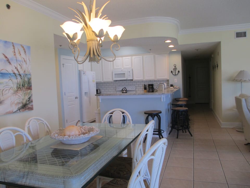 Looking from the dining area into the kitchen.
