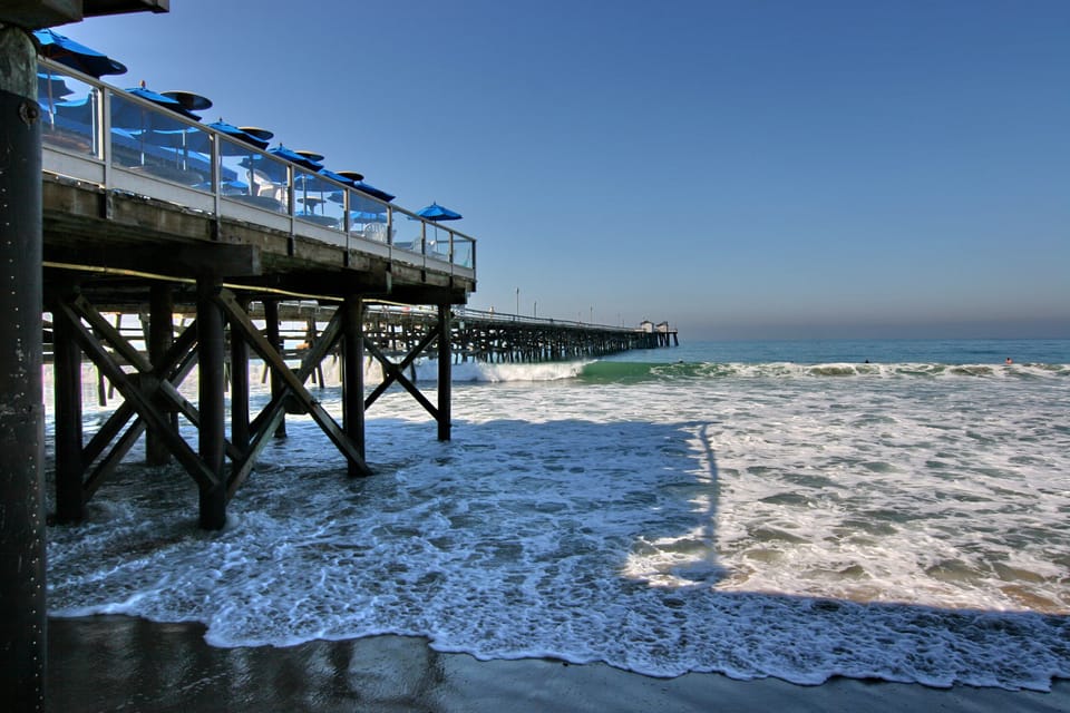 Eat the best Clam Chowder on the pier enjoying the view of the waves and surfers