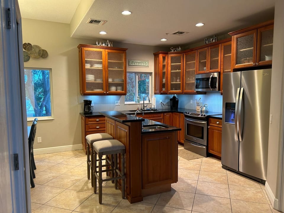 Fully stocked kitchen with island...