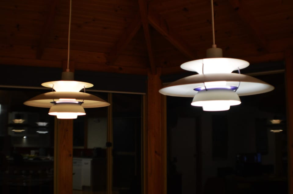 As the night settles in, enjoy the magical effect of the Louis Poulsen lights!