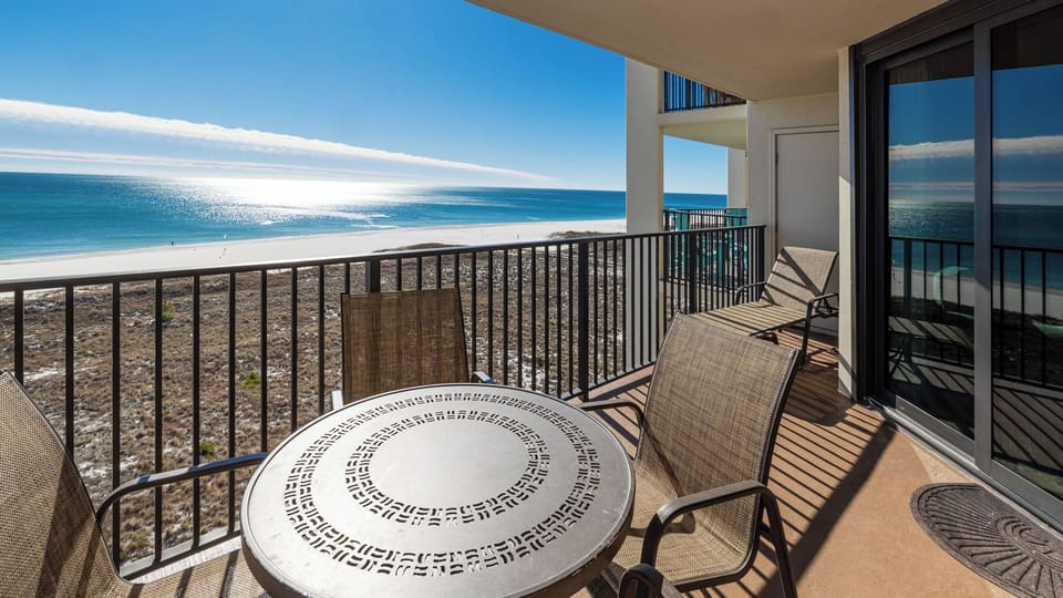 Watch the coastline stretch into the distance and the horizon meet the sky from your balcony and soak up the sun