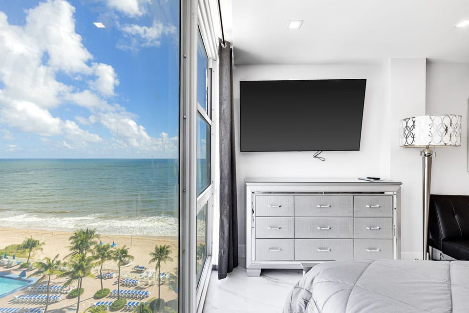 Master bedroom side views of ocean and beach