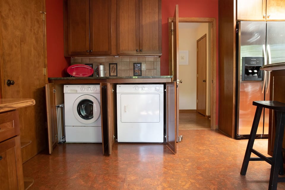 Washer and Dryer, help yourself. There is also an iron and ironing board