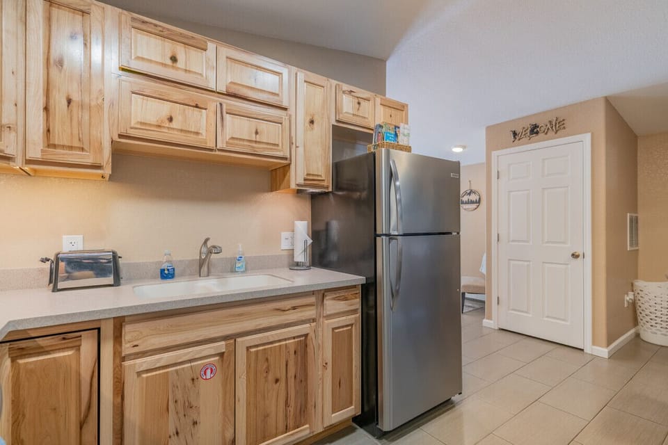 Kitchen Looking at Closet with Washer/Dryer Inside