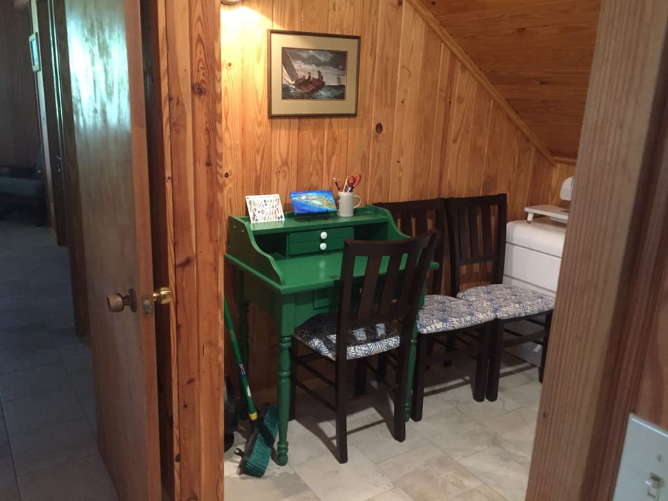 Walk-in closet/study off master bed room with lots of room for your stuff. 