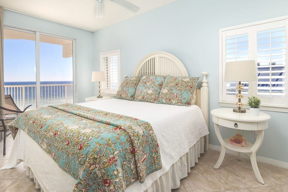 Master Bedroom w/ a wonderful King sized mattress & 2 windows for perfect light.
