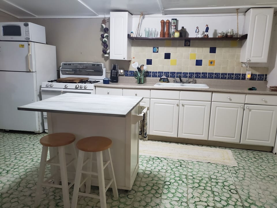 Fully Equiped Kitchen with 12 place settings,utensils, and cookware