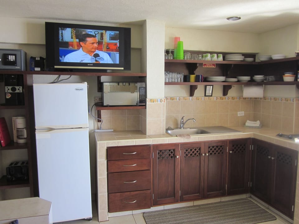Full kitchen, full size fridge, blender, electric skillet, microwave, pots & pan