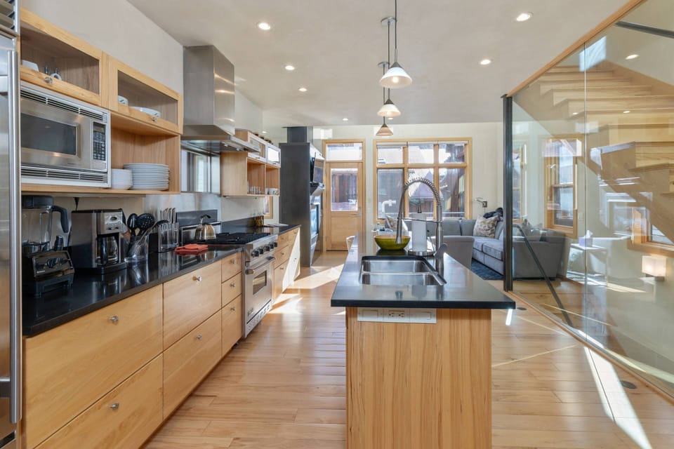 Stunning hardwood floors and modern cabinetry