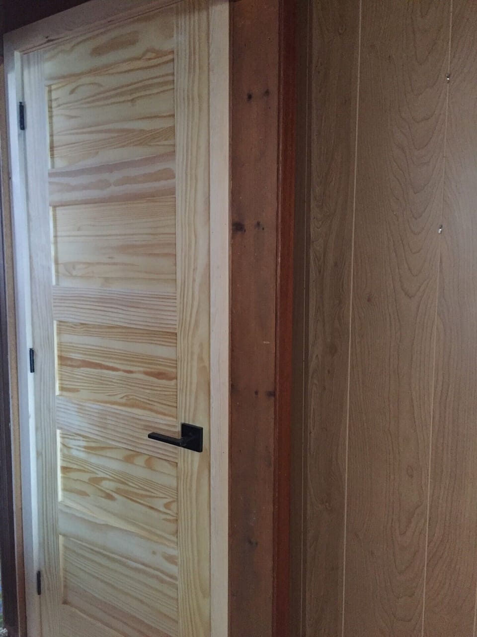 This is the door to the lower level - it shuts firmly - a bonus for parents of toddlers who might otherwise worry about mis-adventures on the staircase.