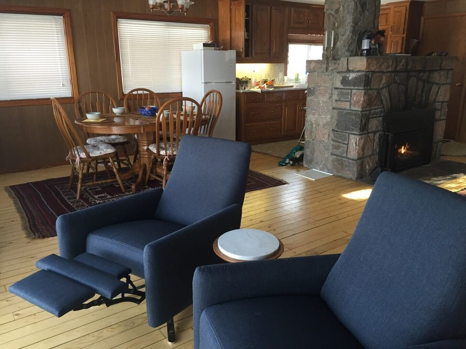 Another view of the large open space in the main living area of the cottage. The rustic pine floors are special feature... recently restored after years of hiding behind plywood and carpet.
